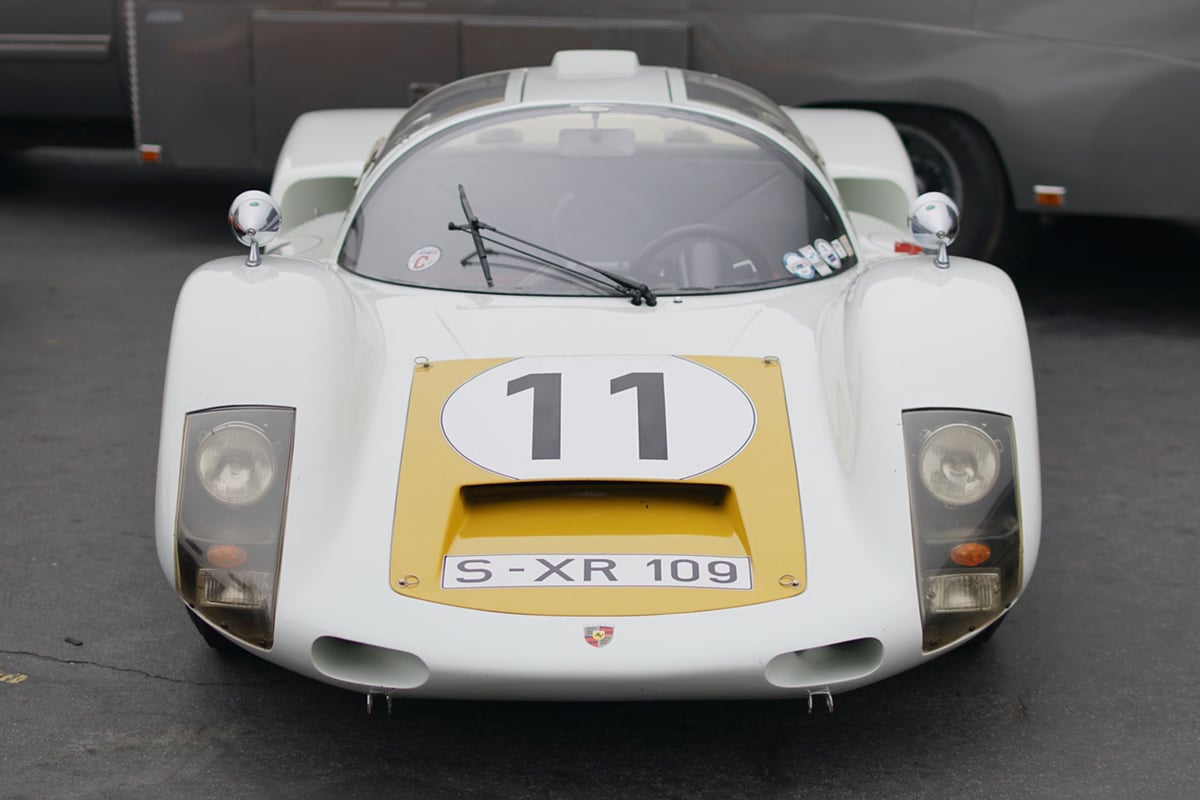 A collector car being inspected and prepared for transport