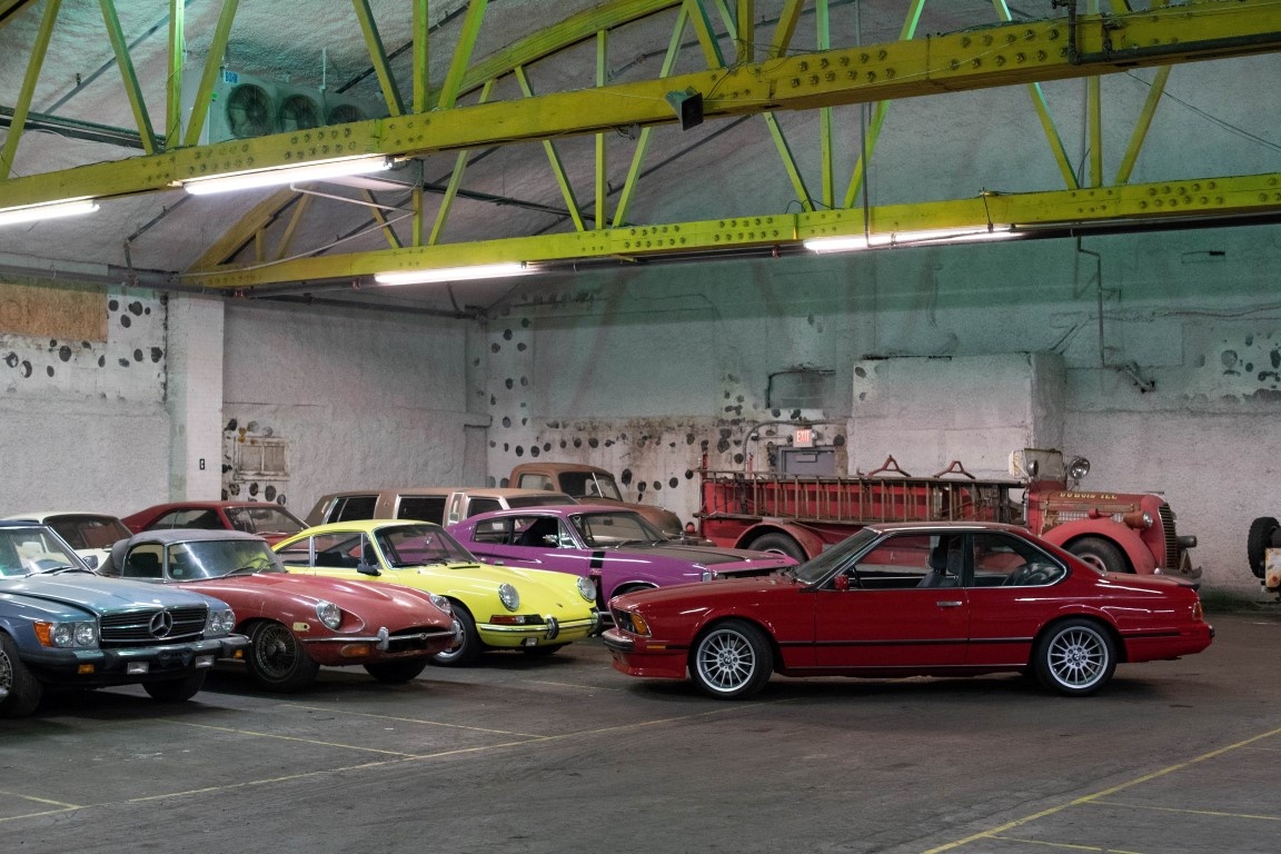 Classic cars inside the West Coast Shipping warehouse in New Jersey