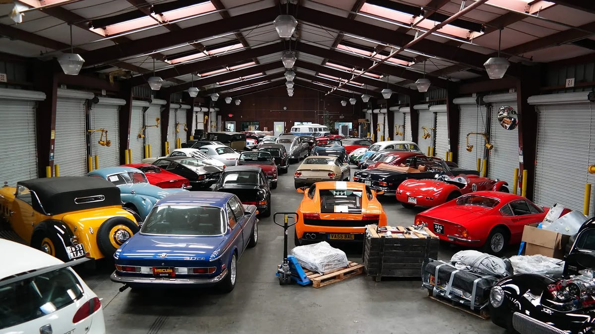 Collector cars inside the West Coast Shipping warehouse in California