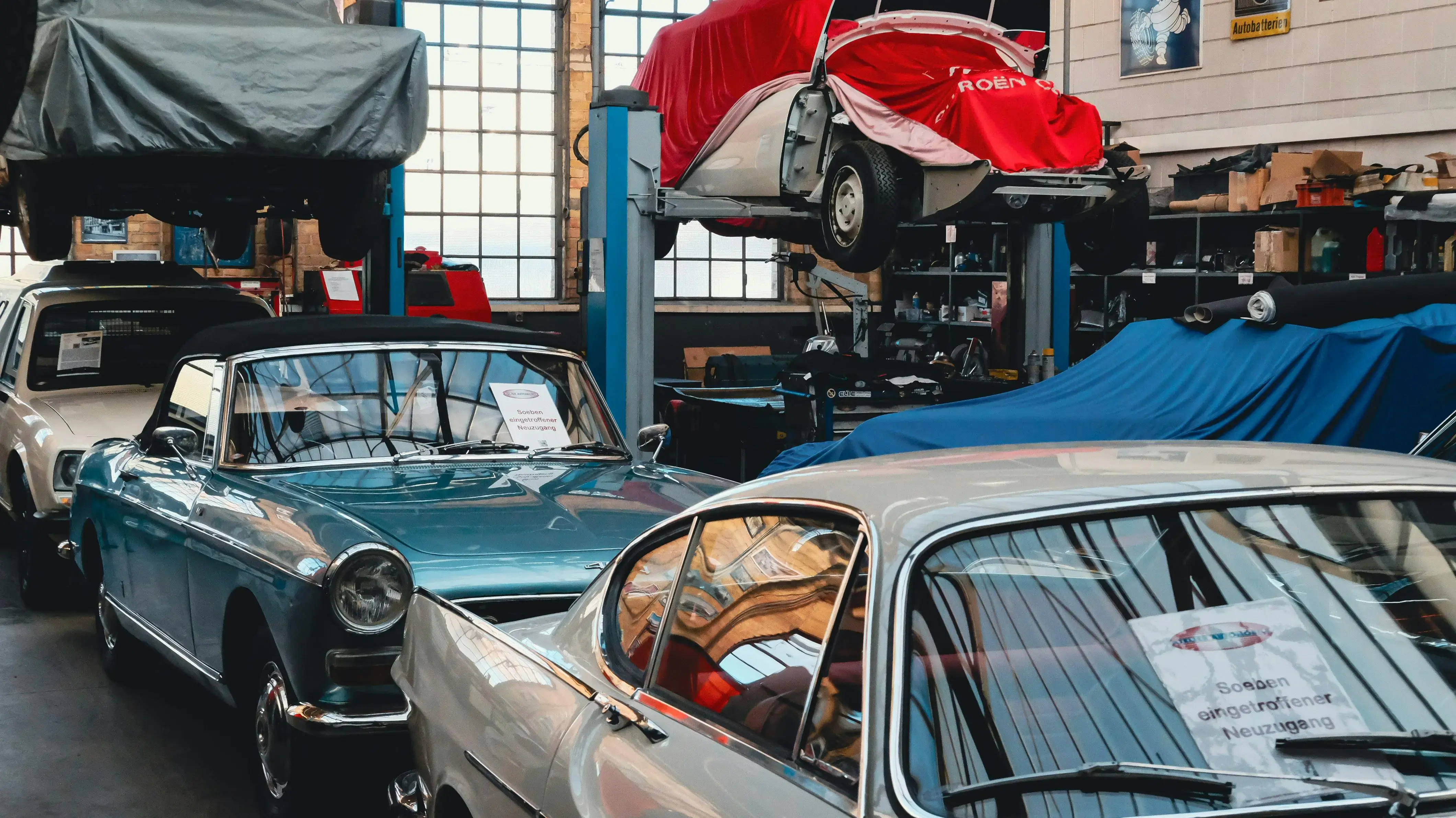Old Cars Inside A Garage Workshop