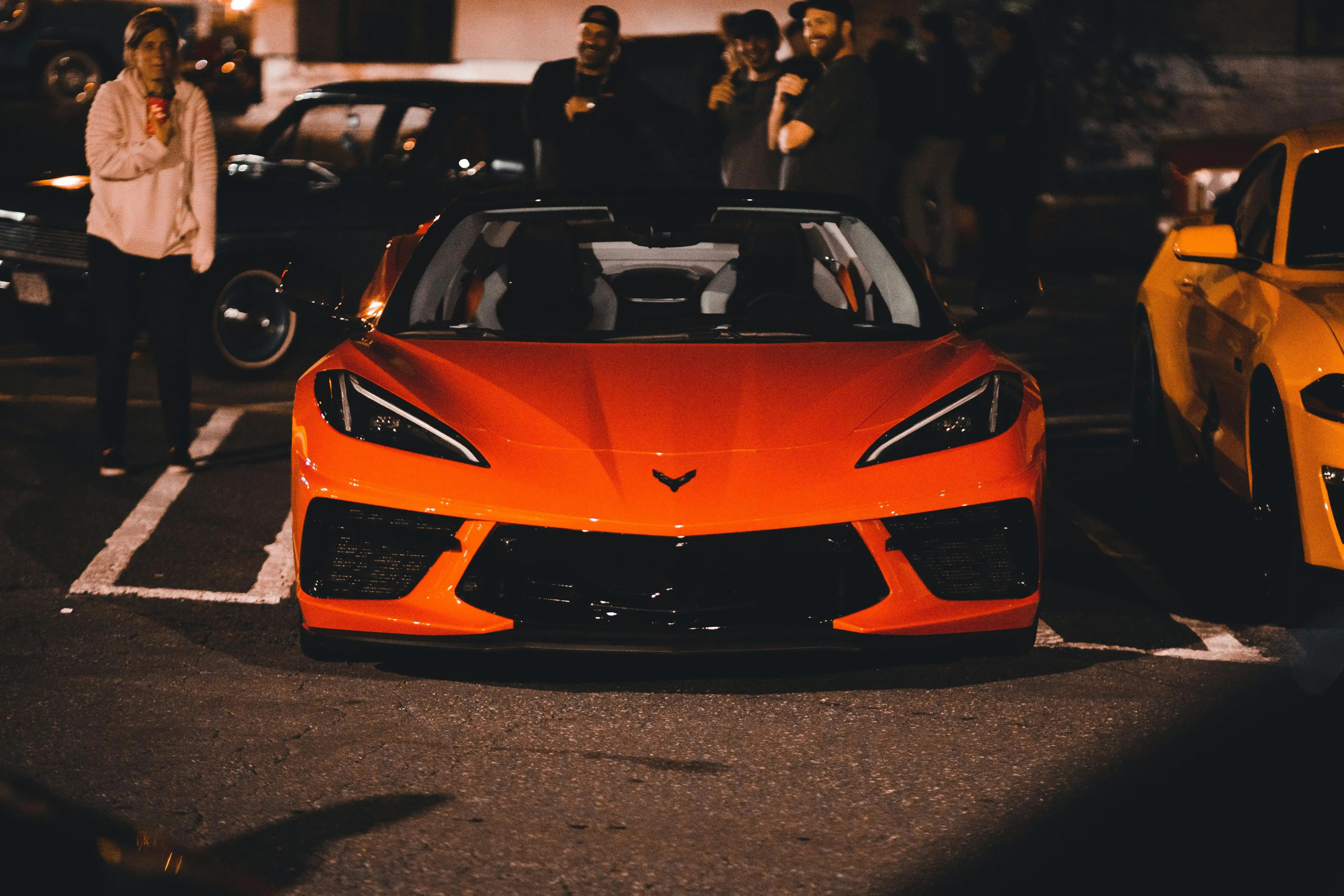 Orange Corvette in a Parking Lot
