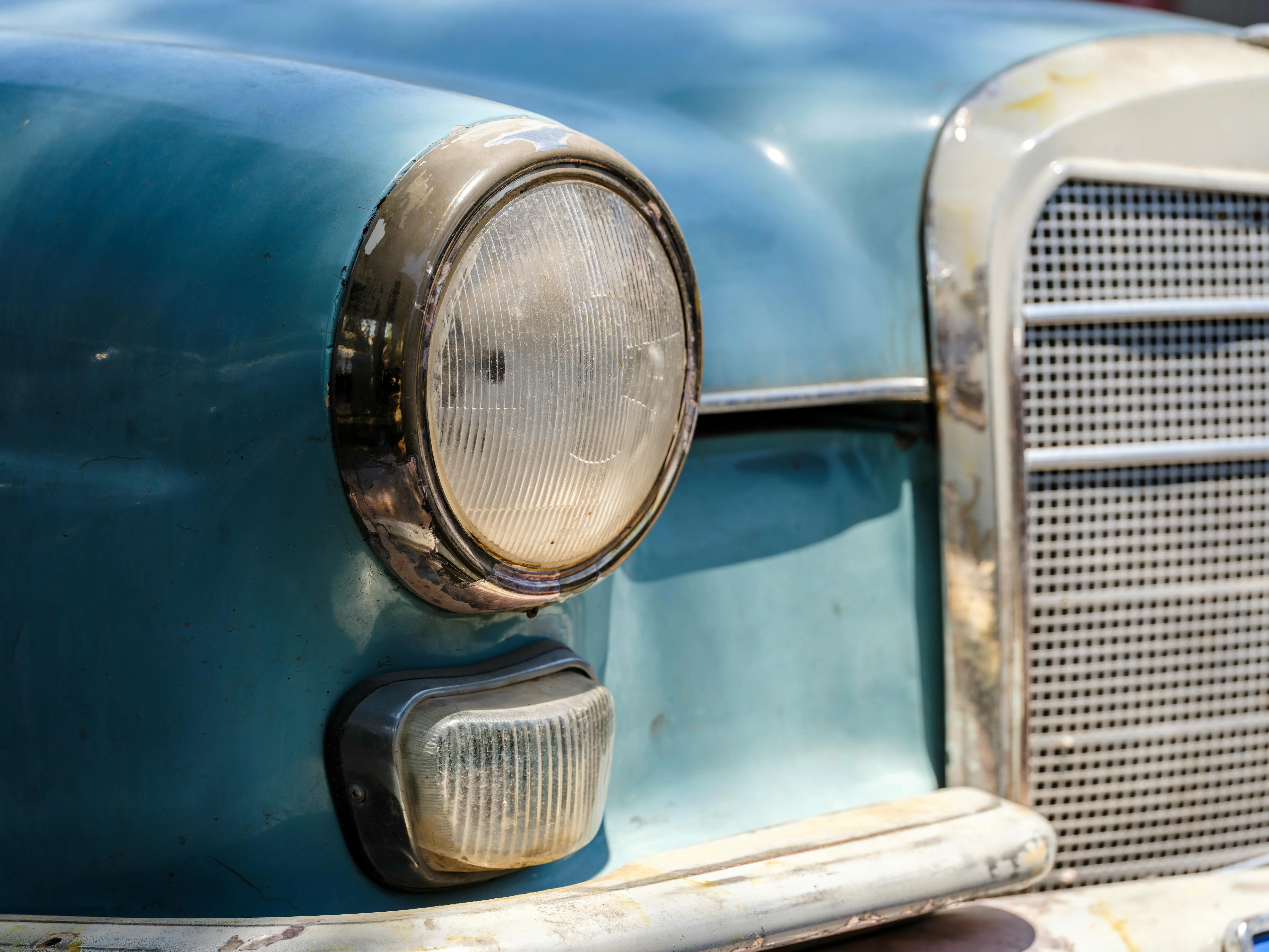 detail of a blue classic car