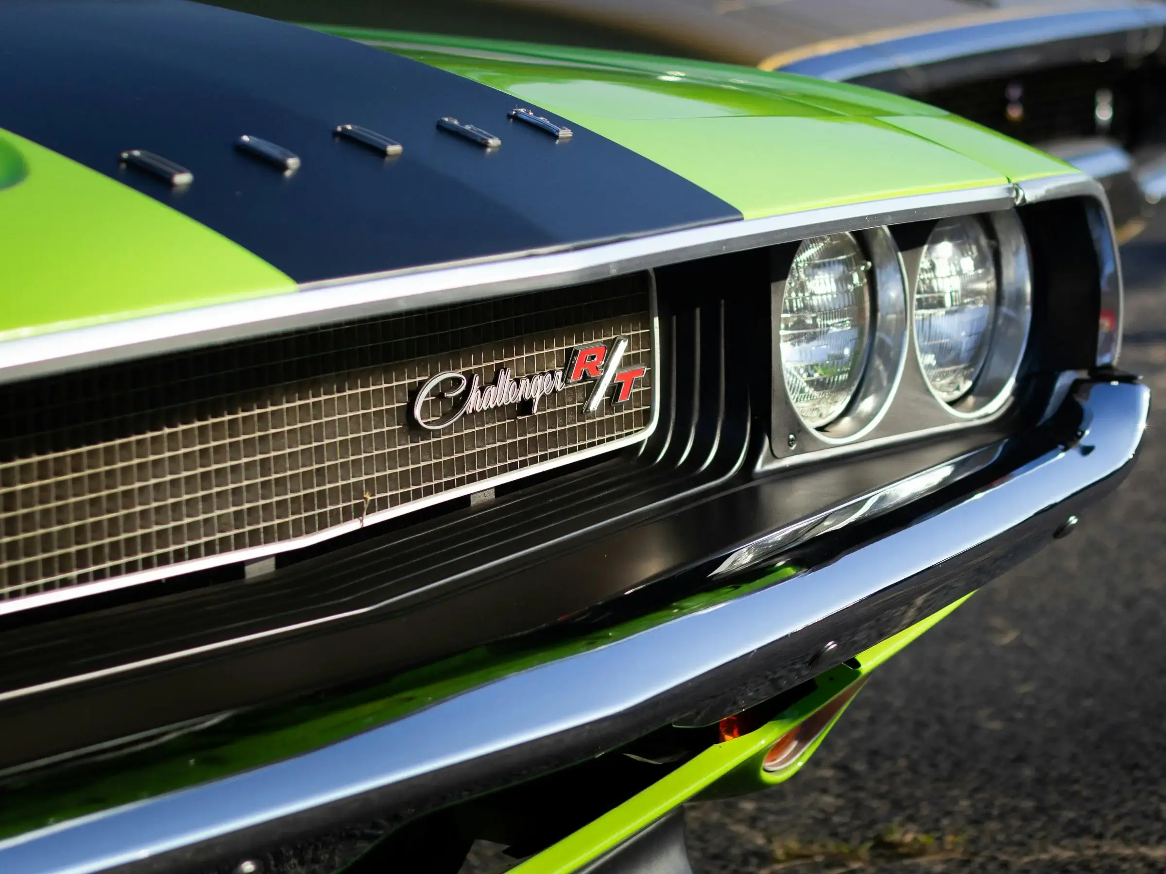 Close-up of Vintage Green and Black Car
