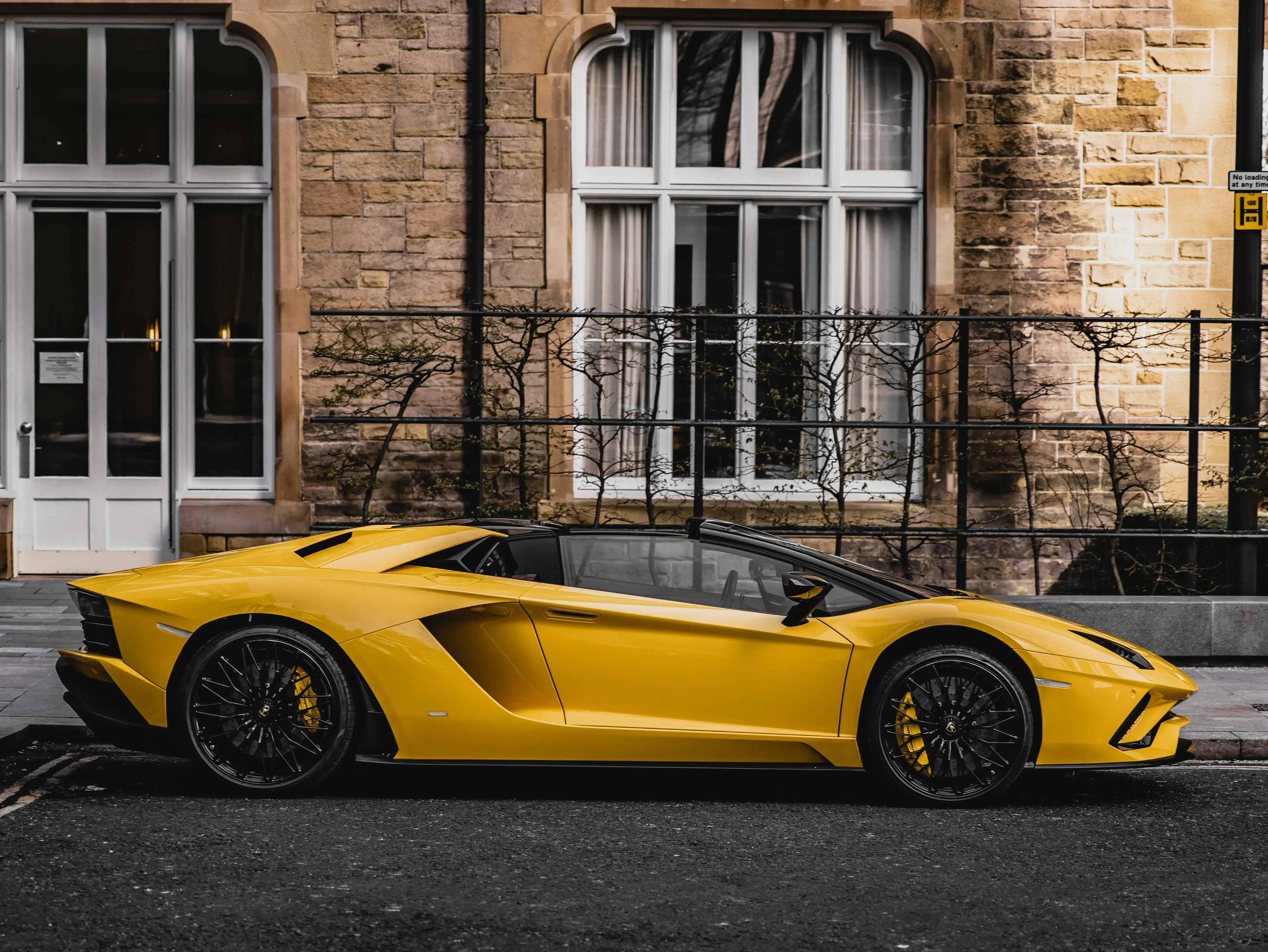 Yellow Lamborghini Aventador Parked on Asphalt