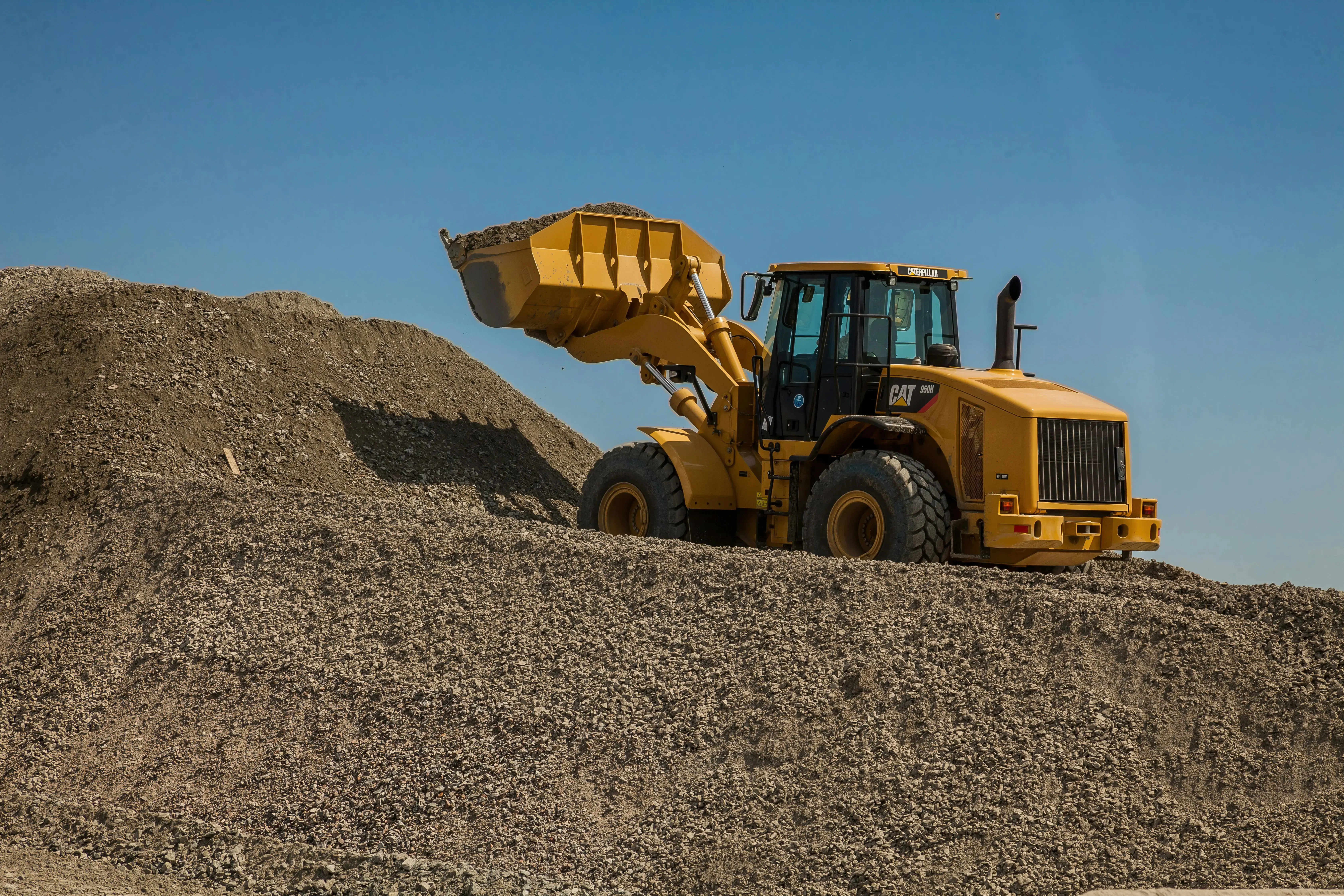 Heavy Machinery in Construction Site with Blue Sky