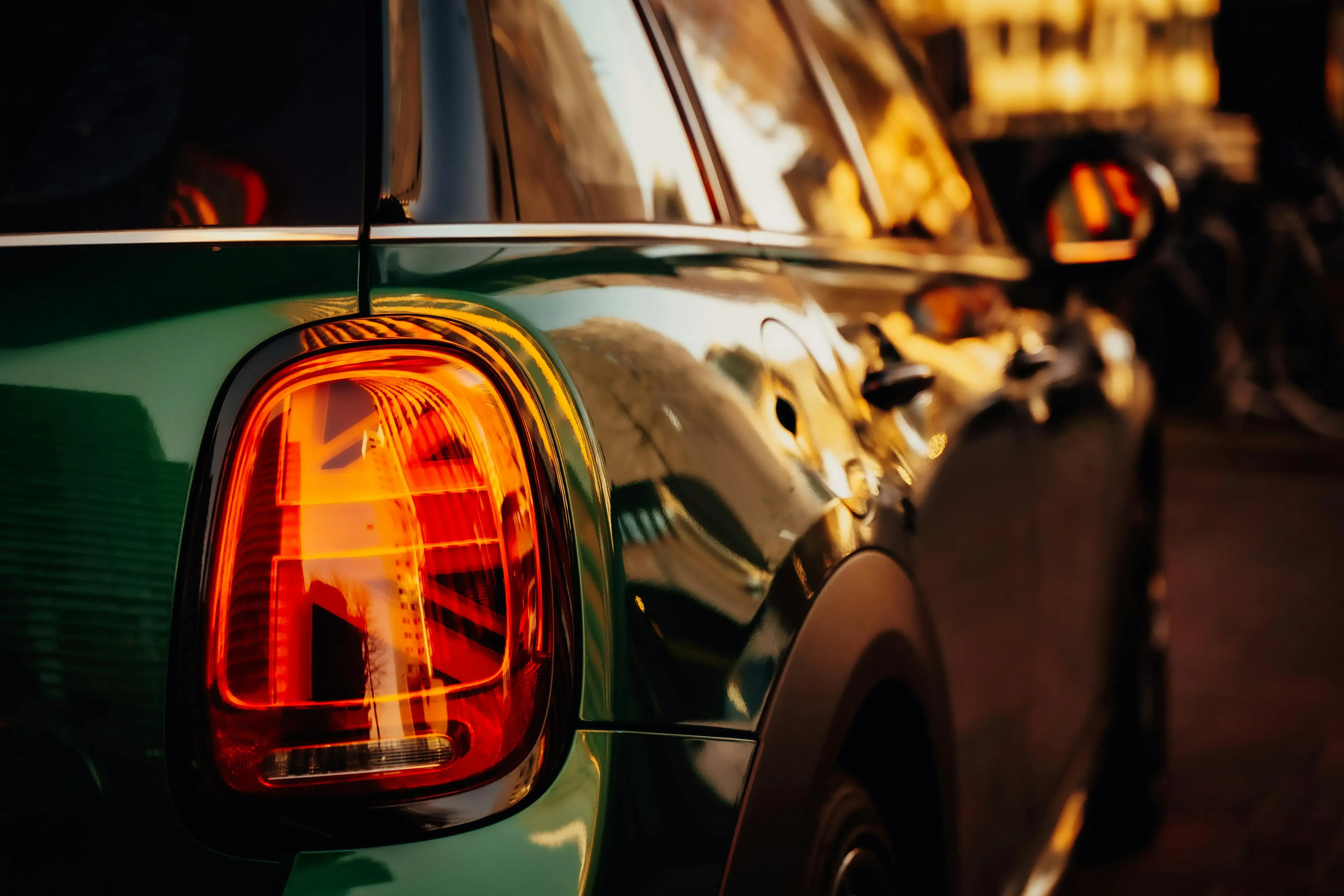 Green Shiny Car ib Close Up Photography