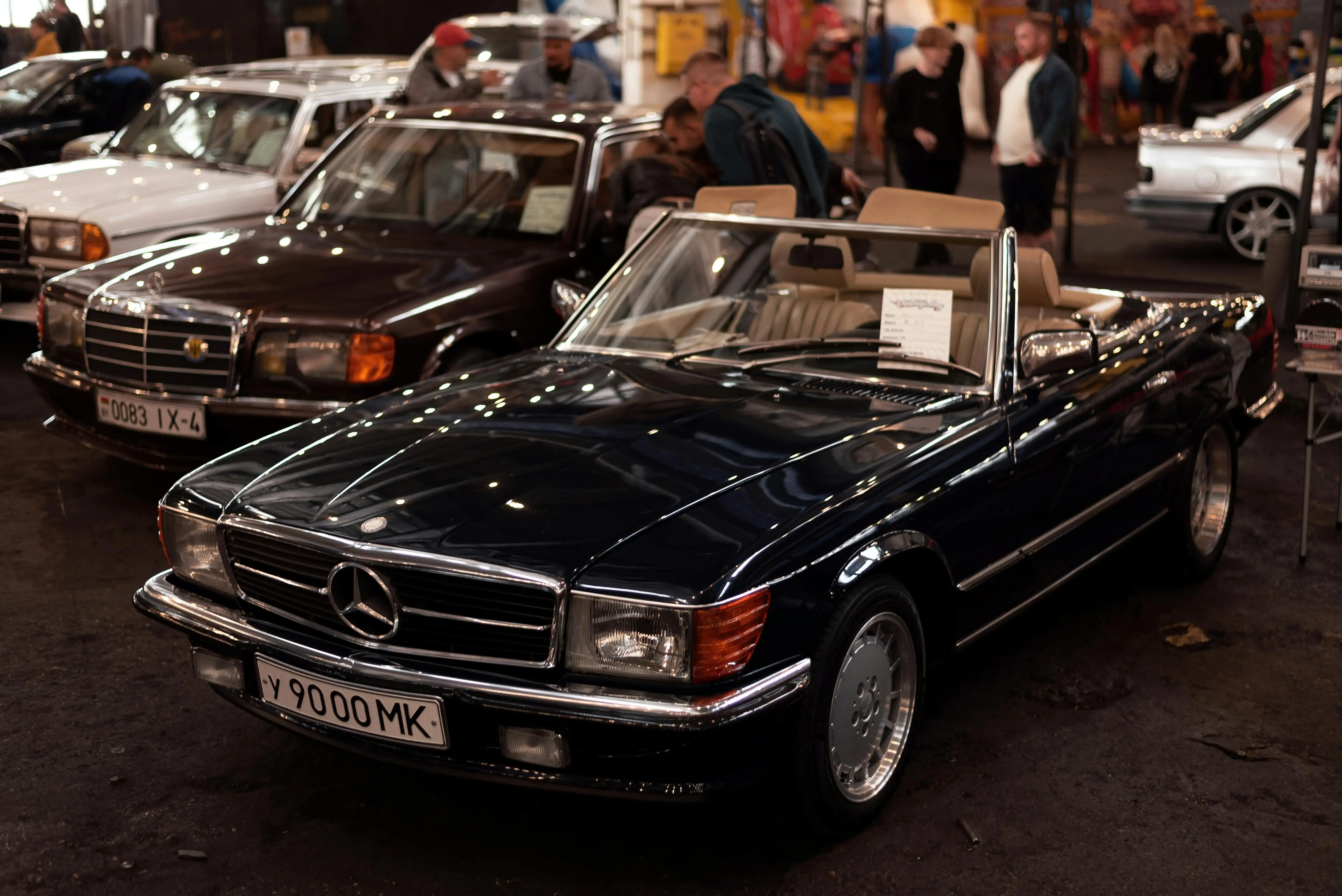 Lined Up Mercedes Benz Cars Parked at a Car Show