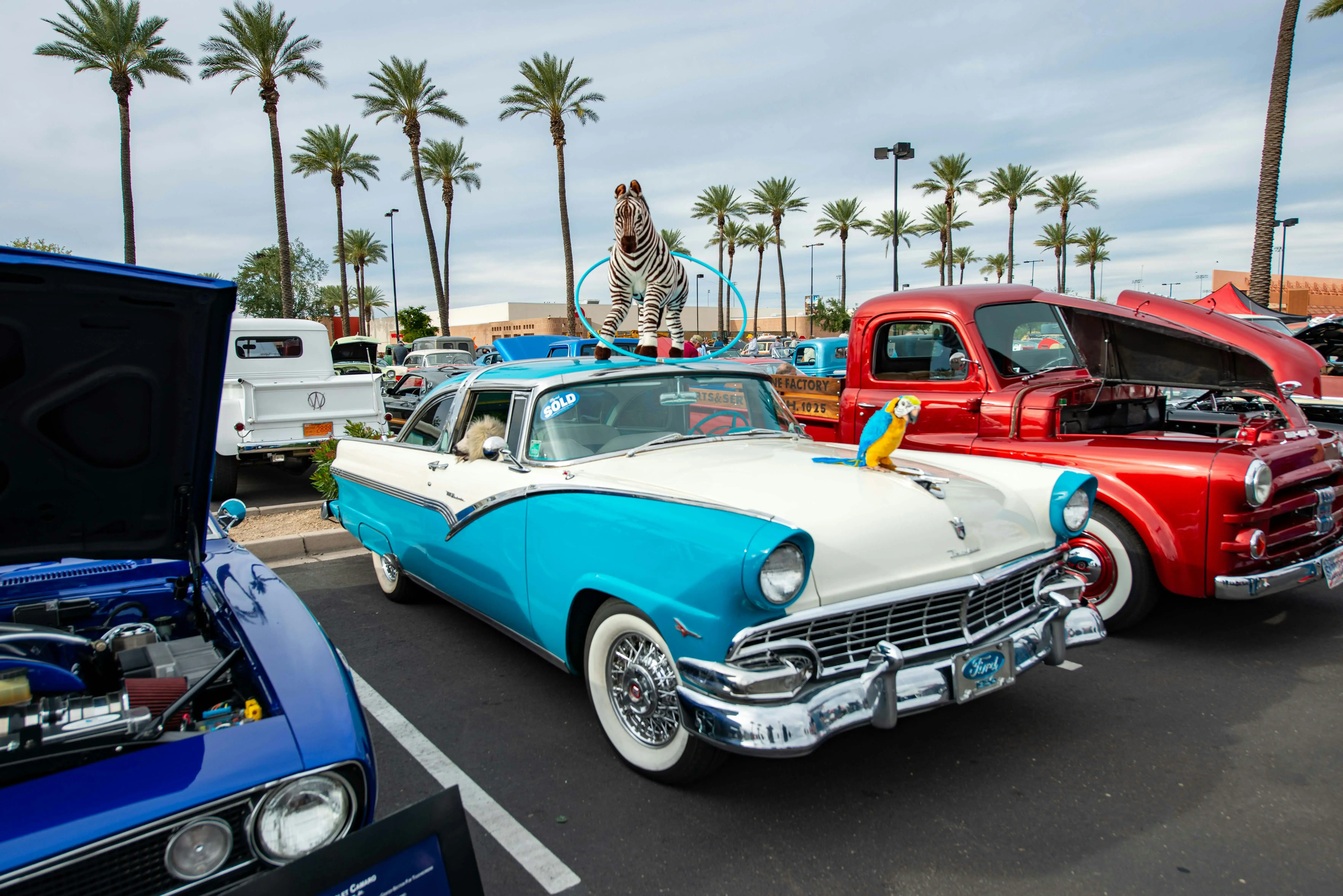 Blue Vintage Car Parked on Parking Lot