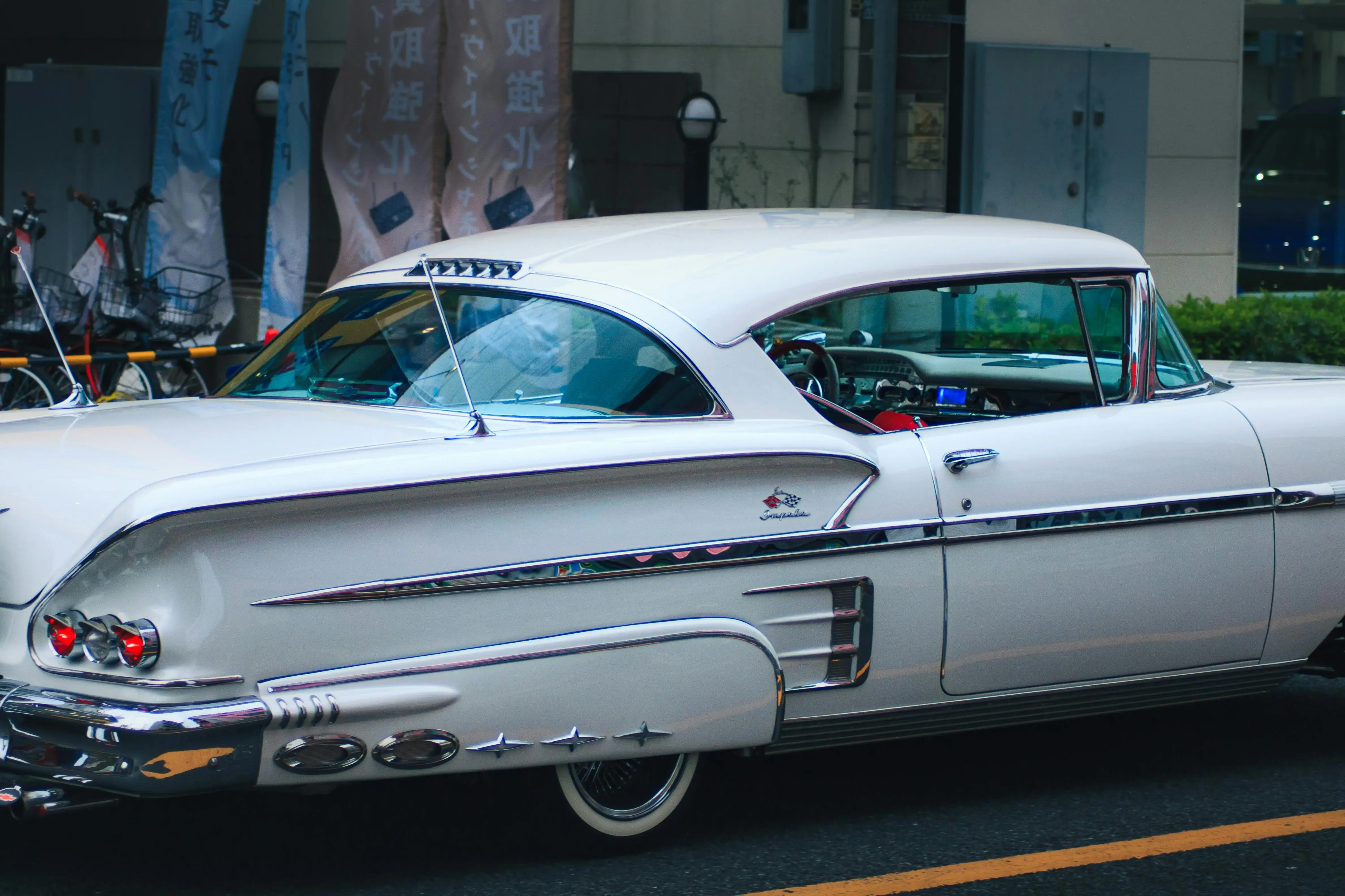 Classic White Vintage Car on City Street