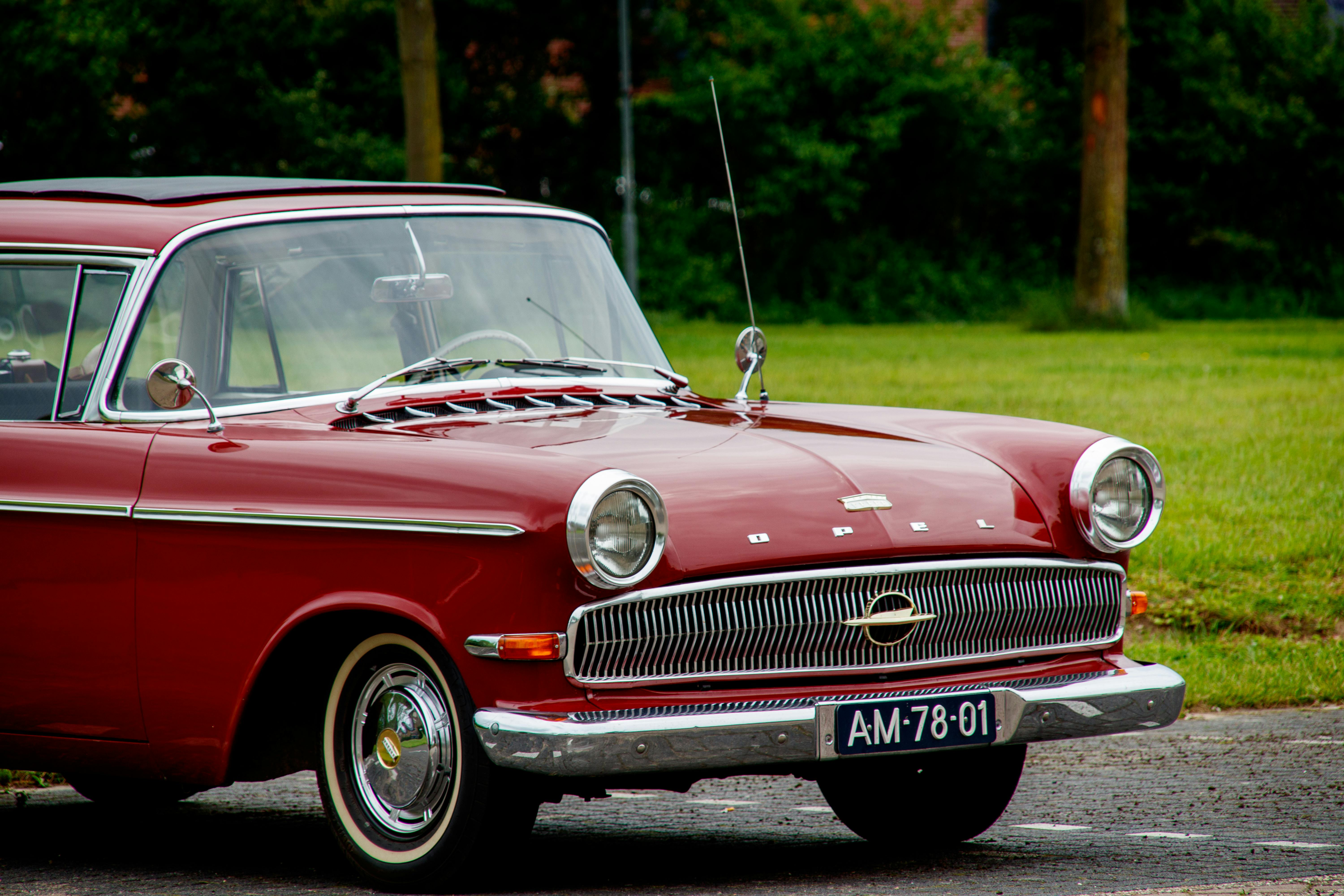 Classic Red Opel Car in Outdoor Setting