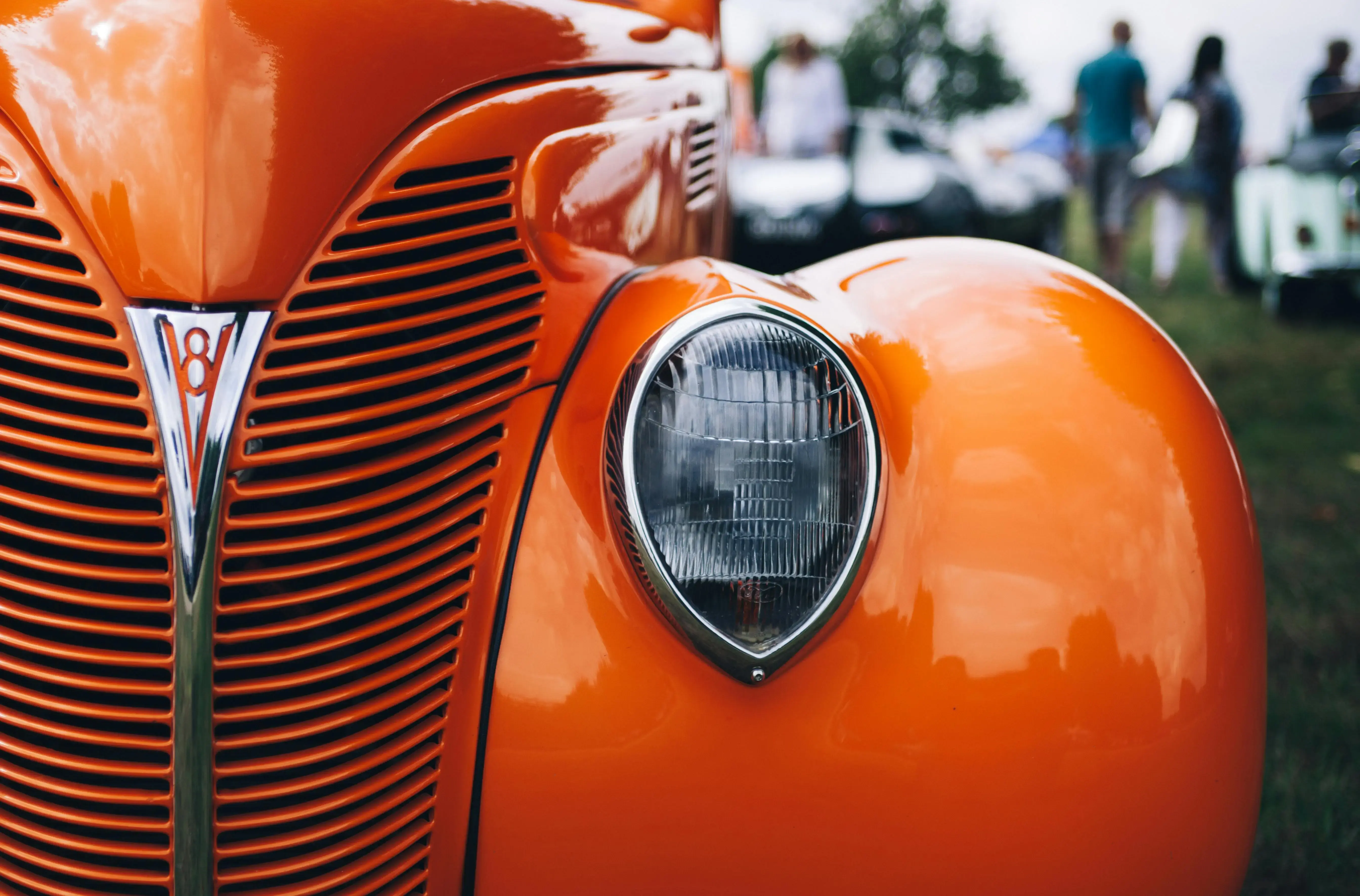 Focus Photography of Classic Orange Vehicle
