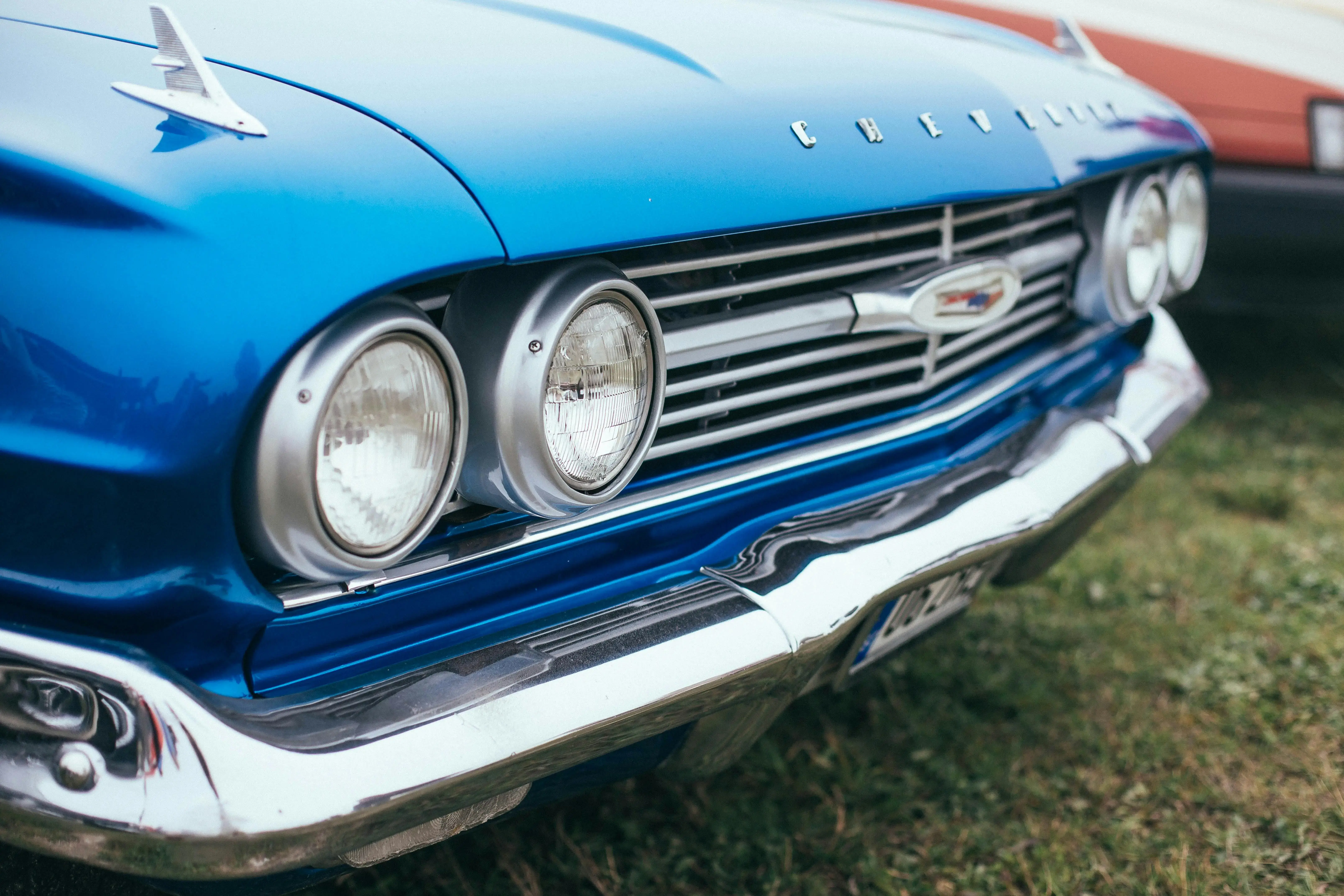 A Close-Up Shot of a Blue Vintage Car