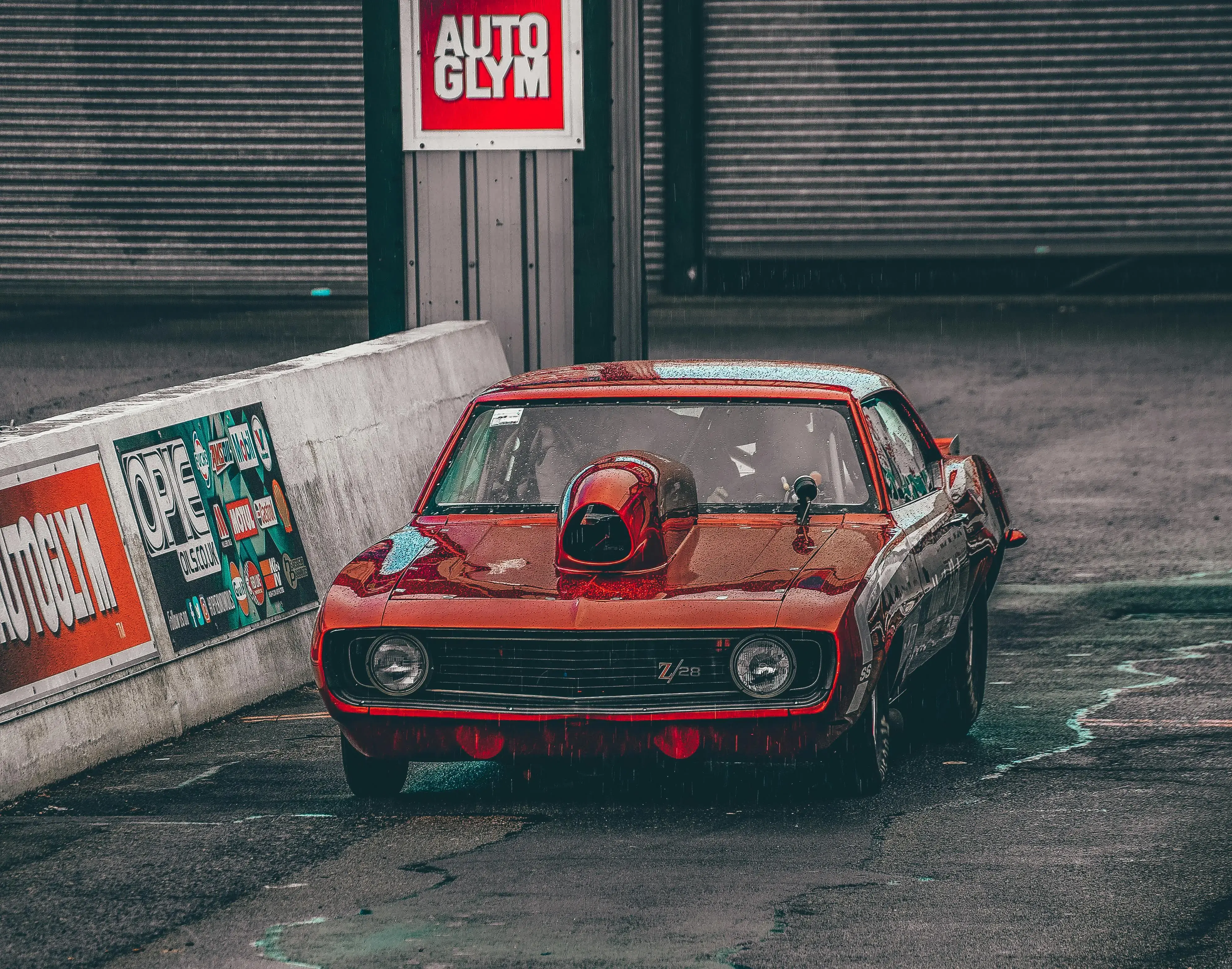 Red Car on the Race Track