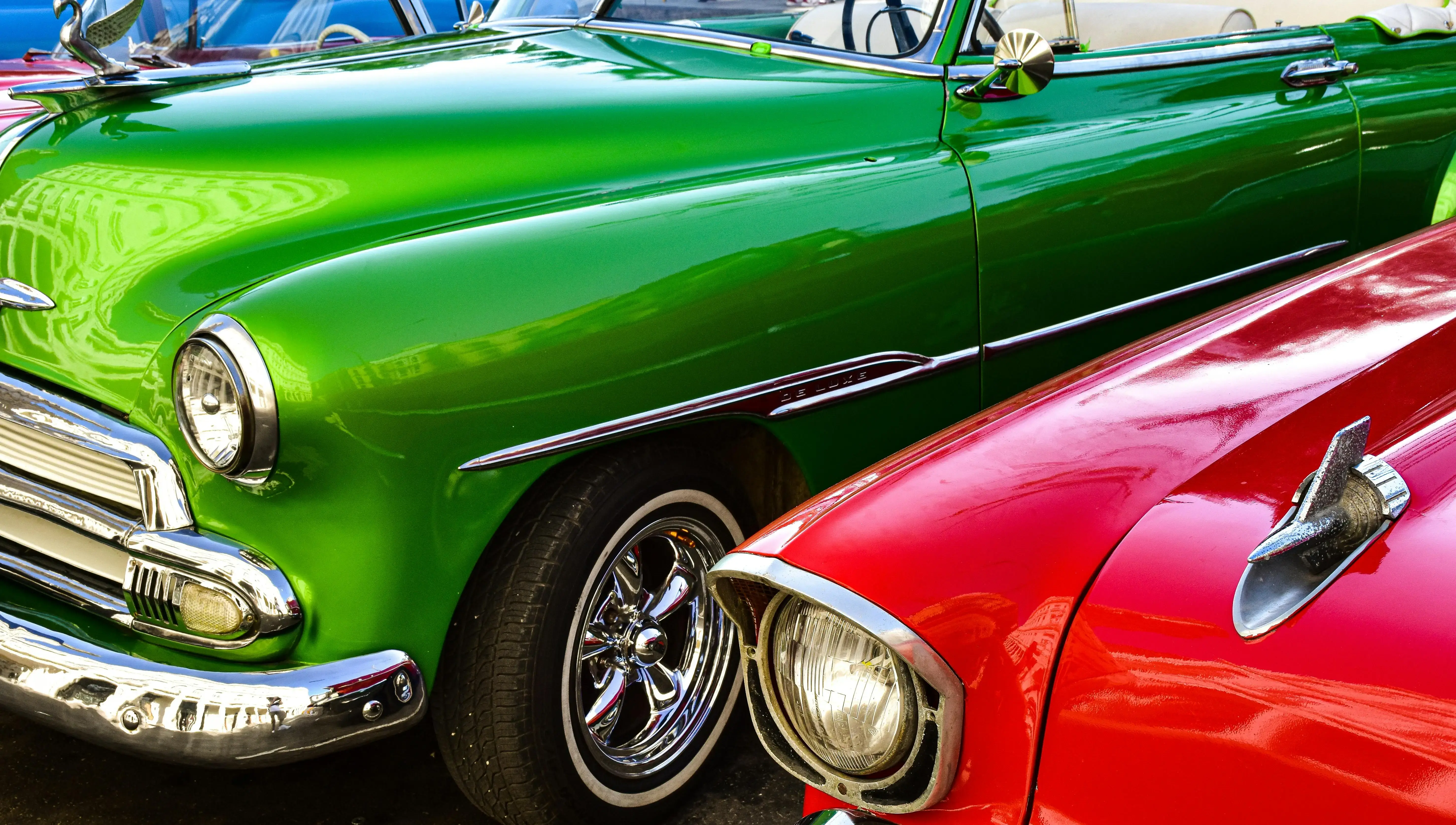 Close-up of a Green and Red Classic American Cars