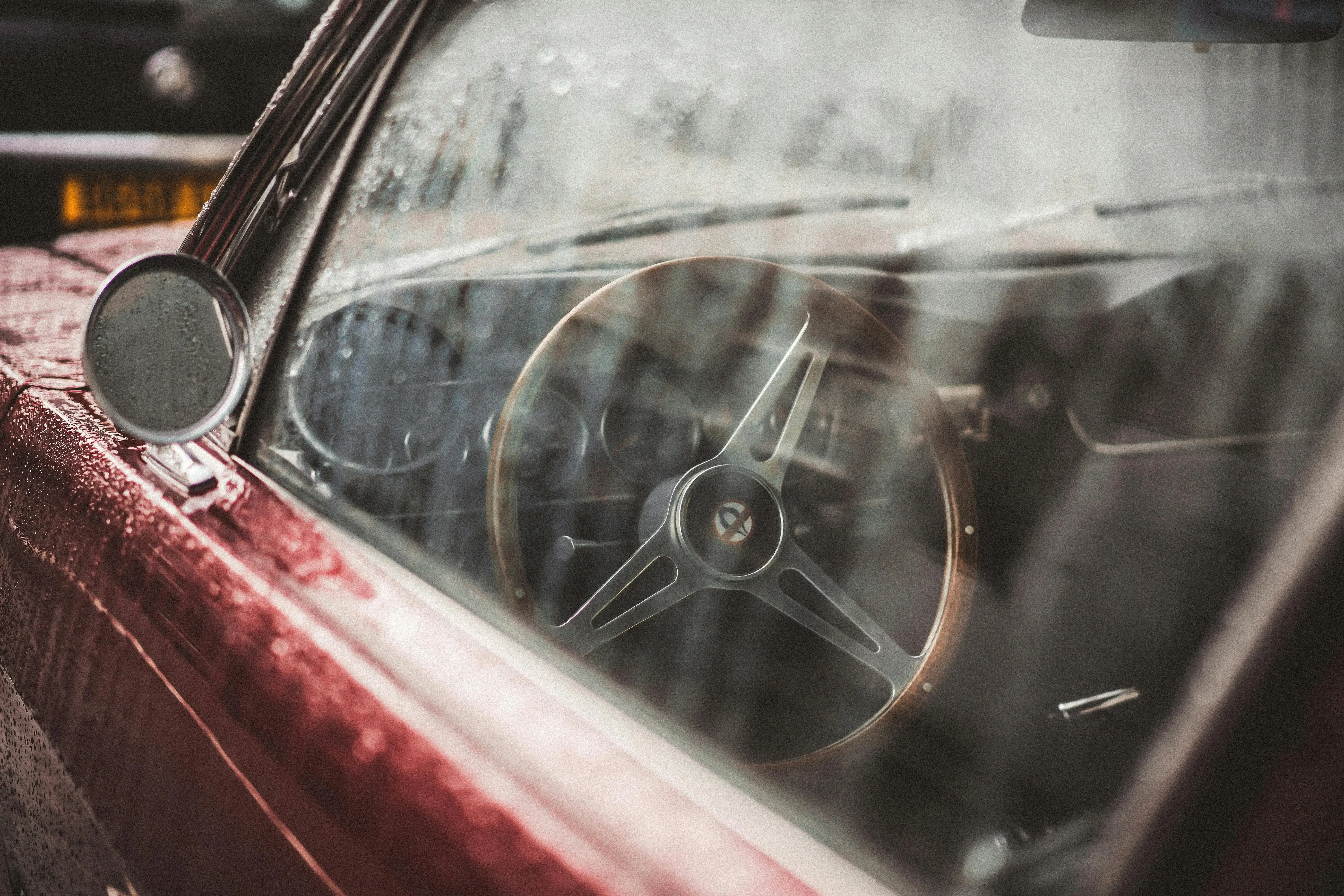 A Wet Red Classic Car