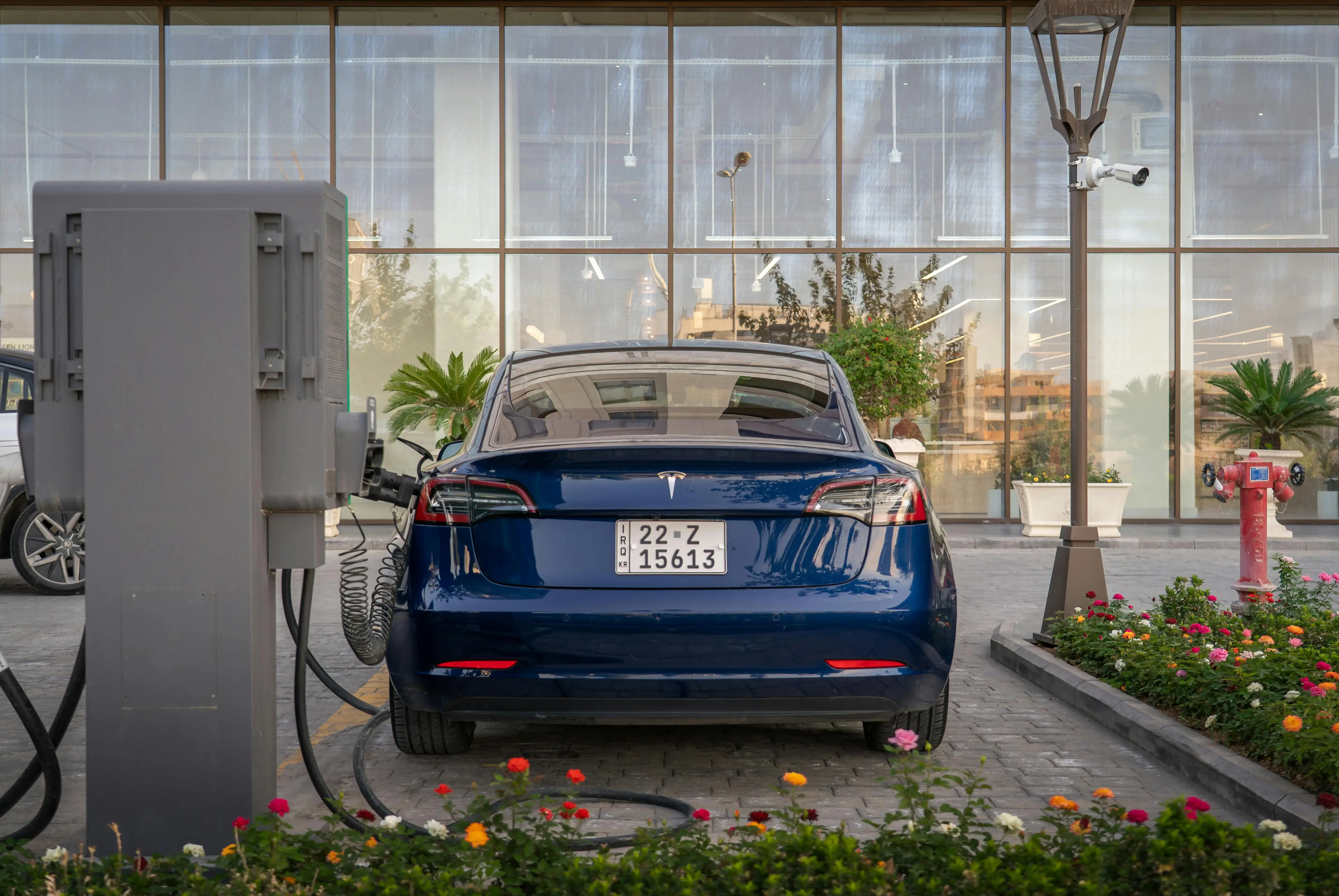 Electric Car Charging at Modern Urban Station