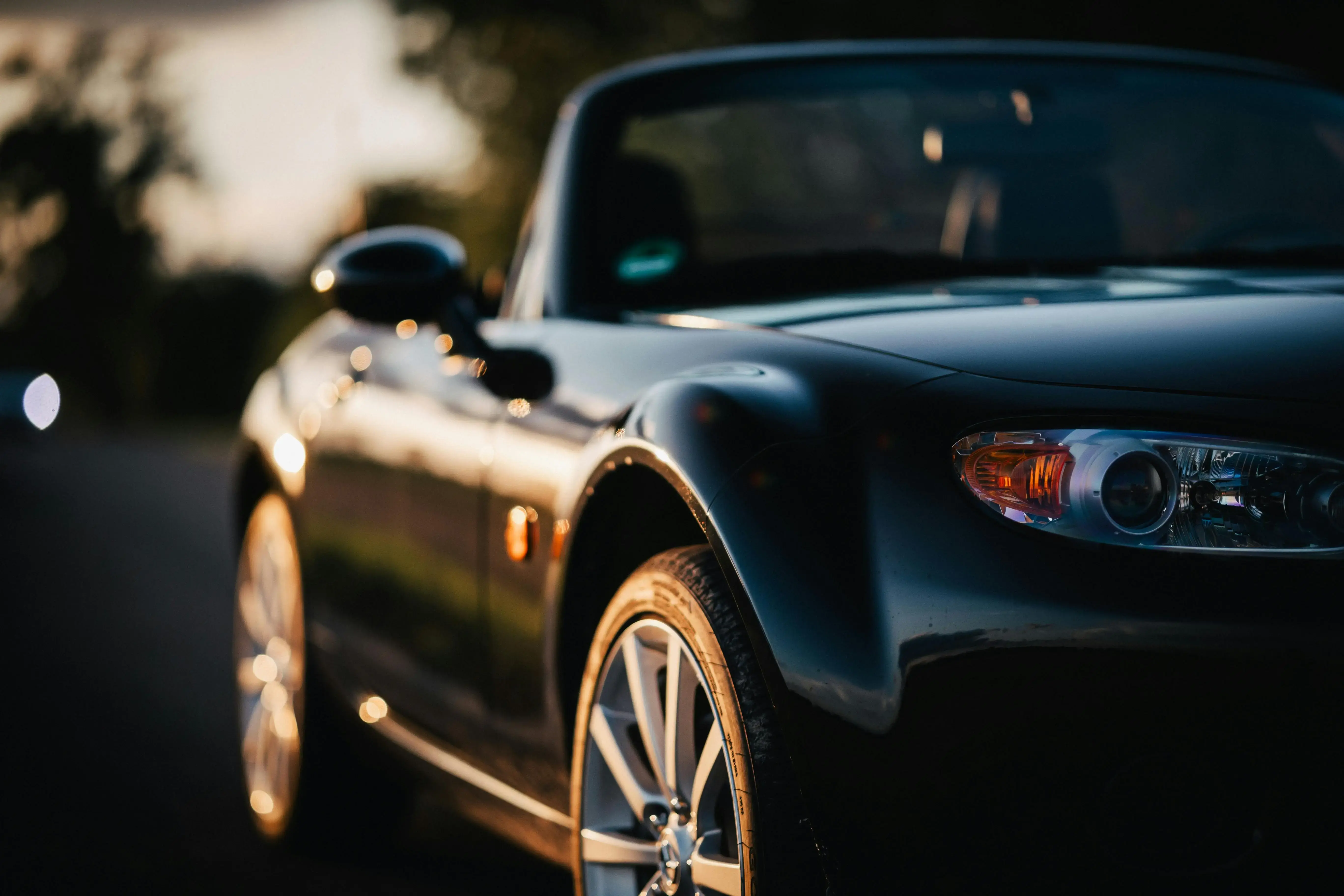 A Modern Black Mazda MX-5