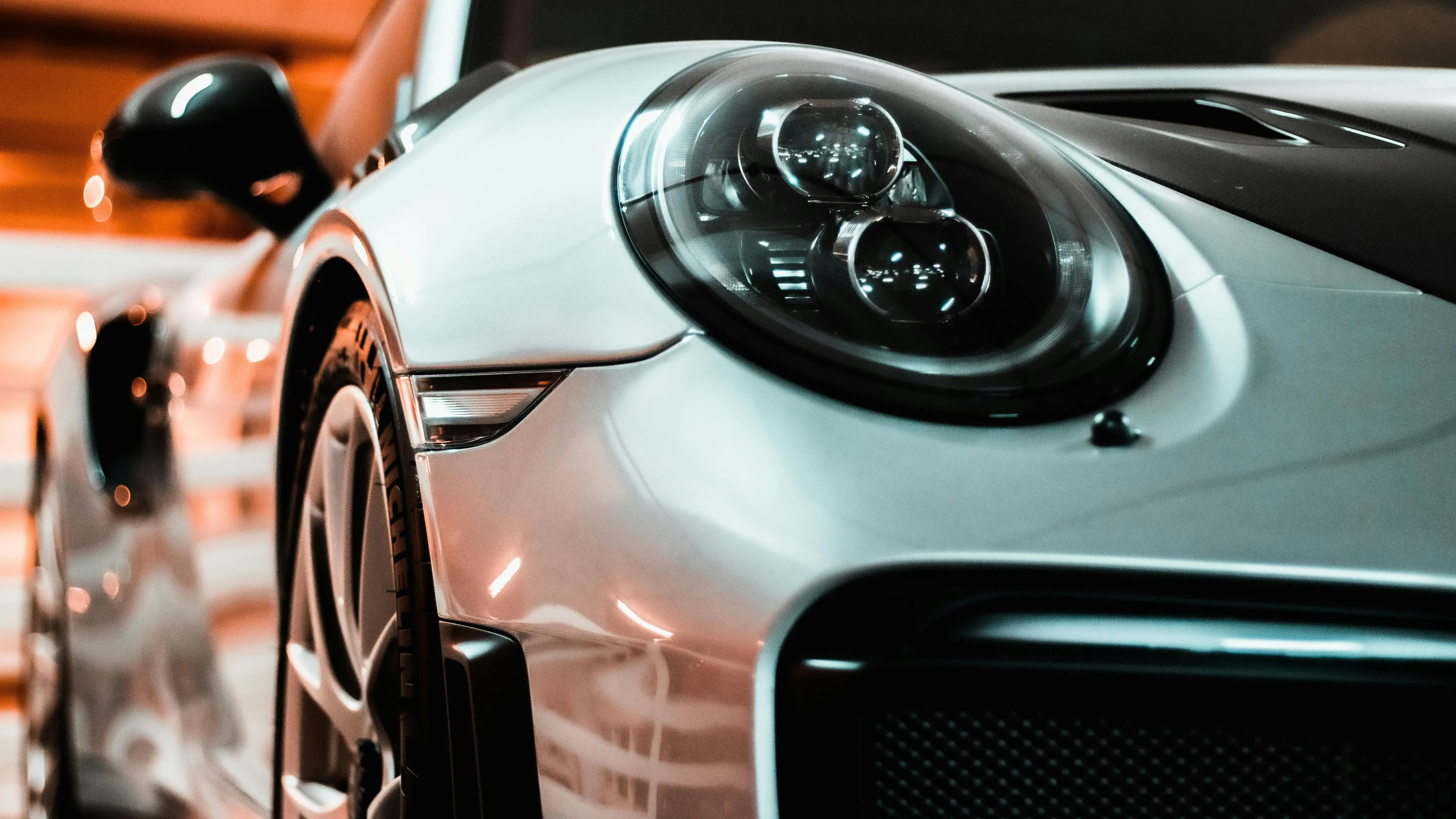 Silver Car with Projector Headlights
