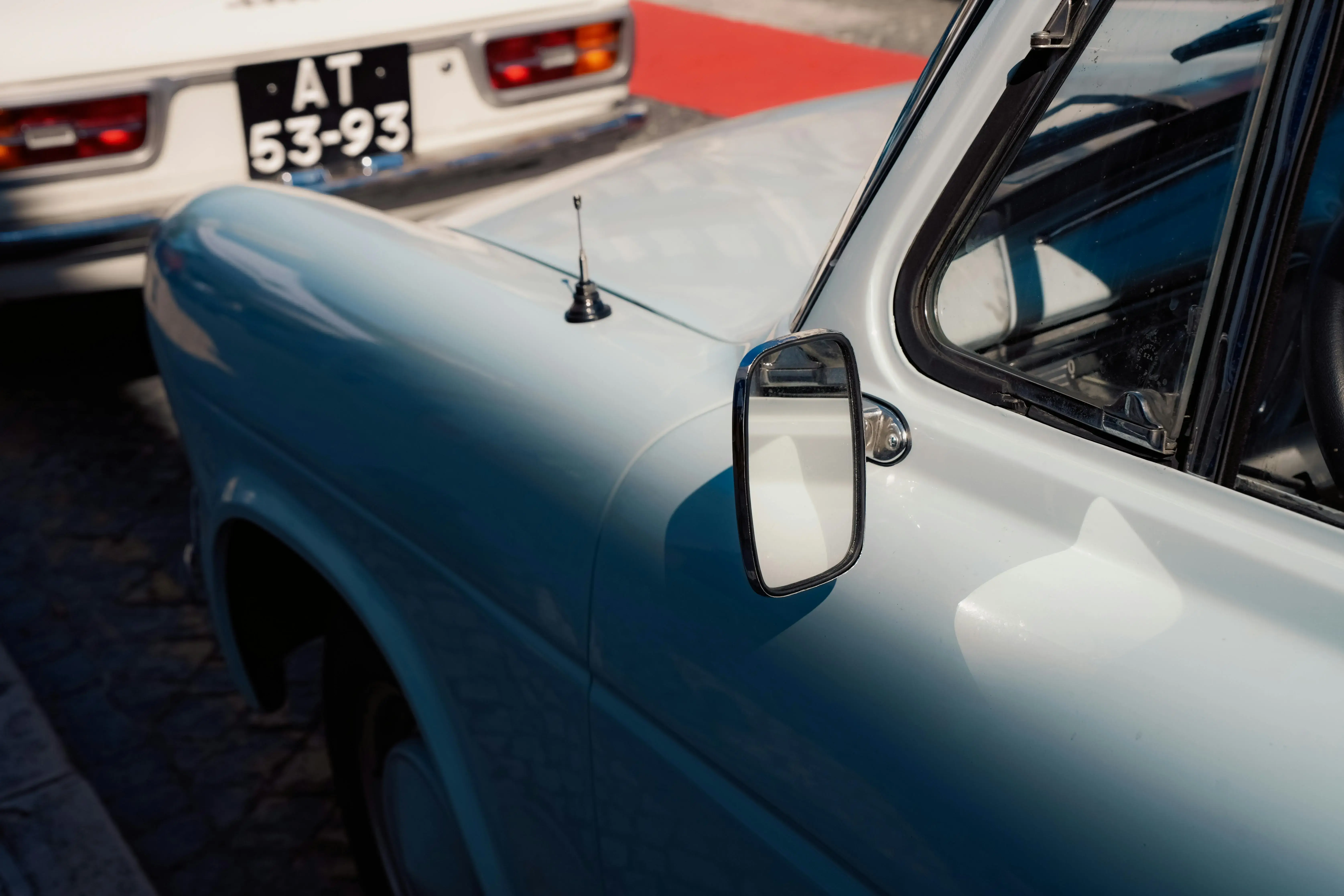 Close-up of Classic Vintage Cars in Sunlight