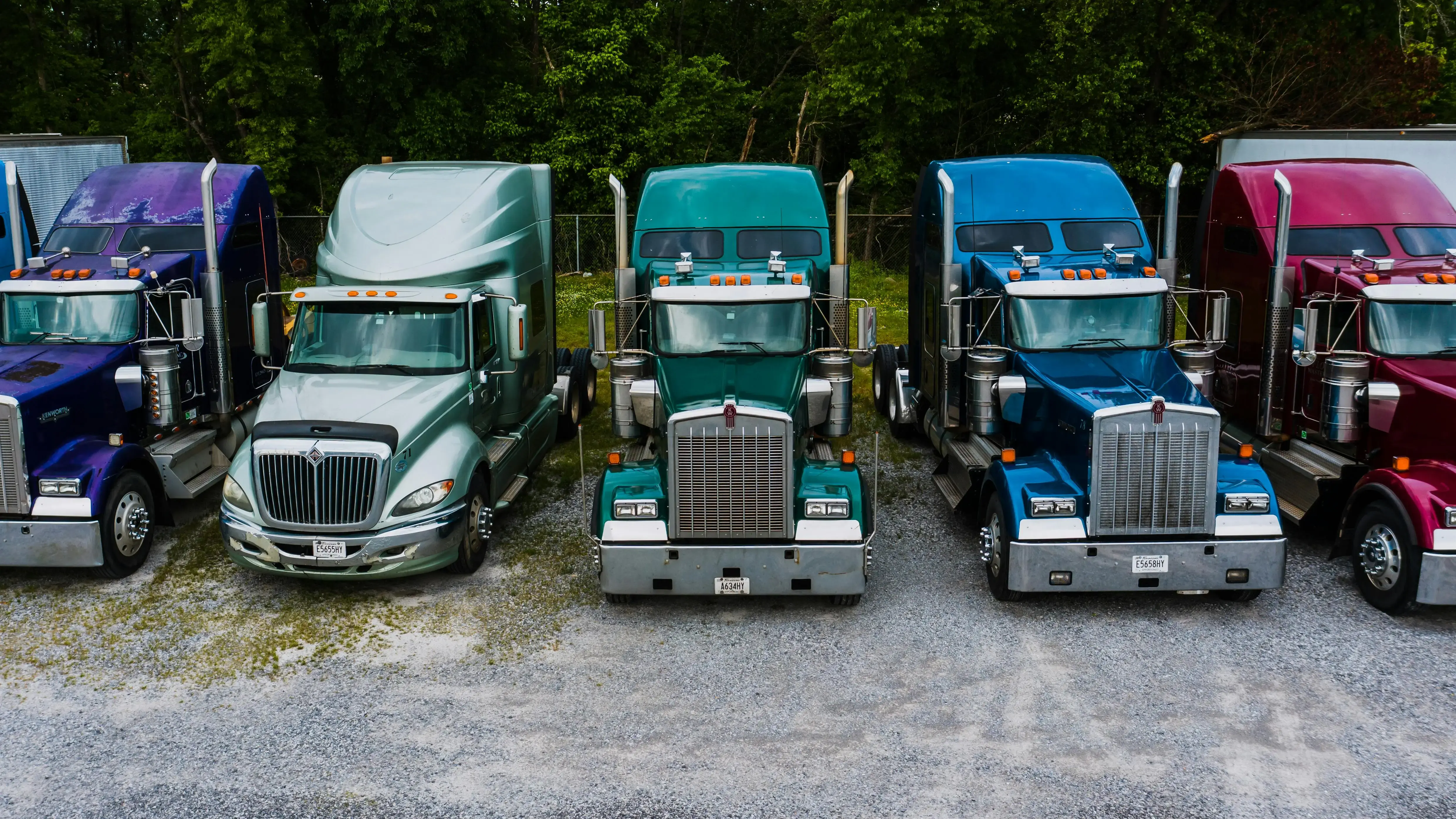 Industrial retro style trucks parked in row