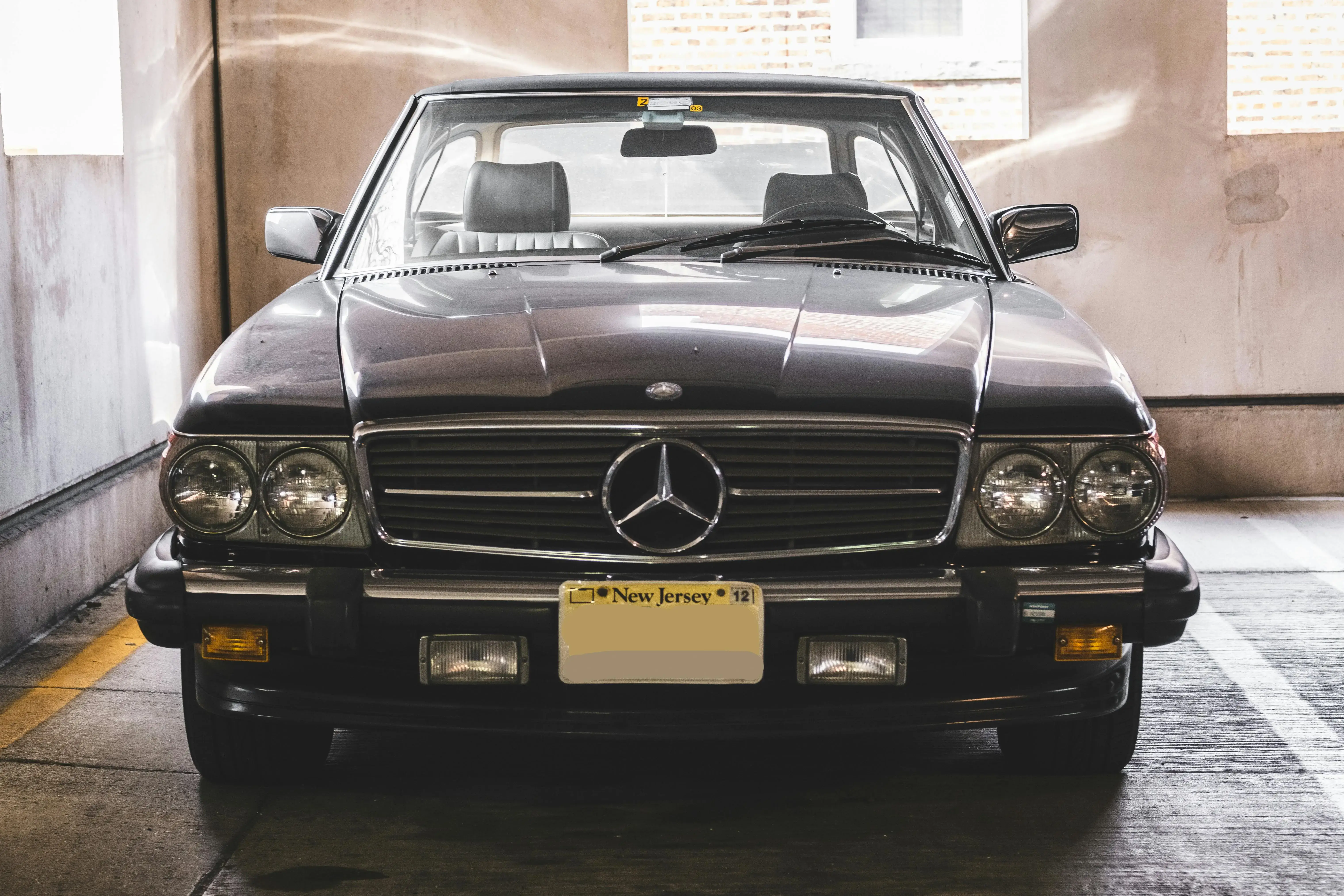 Black Mercedes Benz Car on a Carpark